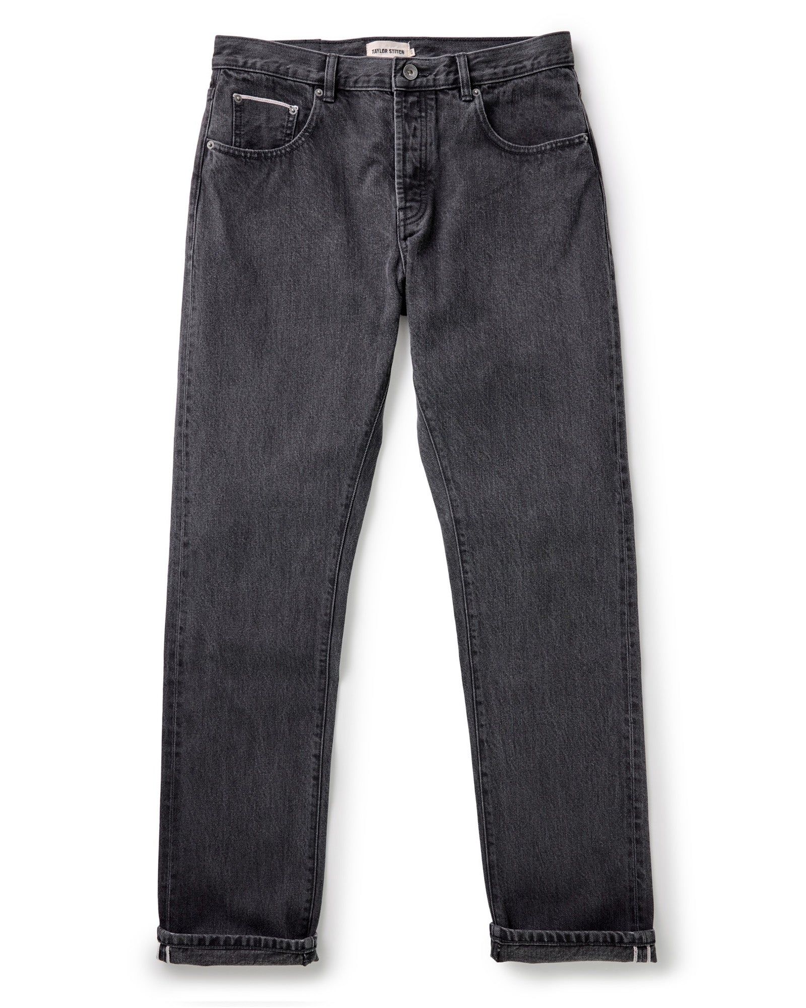 flatlay of The Democratic Jean in Washed Black Organic Slub Selvedge, Bottoms by Taylor Stitch
