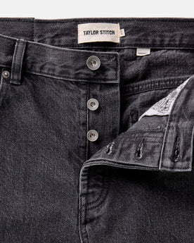 material shot of the button fly on The Democratic Jean in Washed Black Organic Slub Selvedge, Bottoms by Taylor Stitch