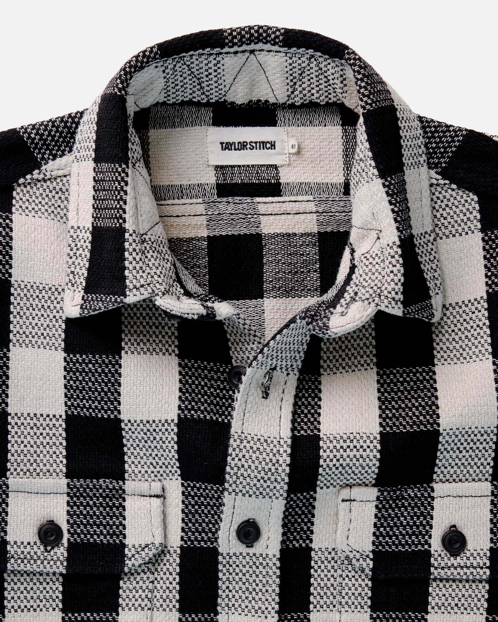 material shot of the collar on The Division Shirt in Black Indigo Check, Wovens by Taylor Stitch