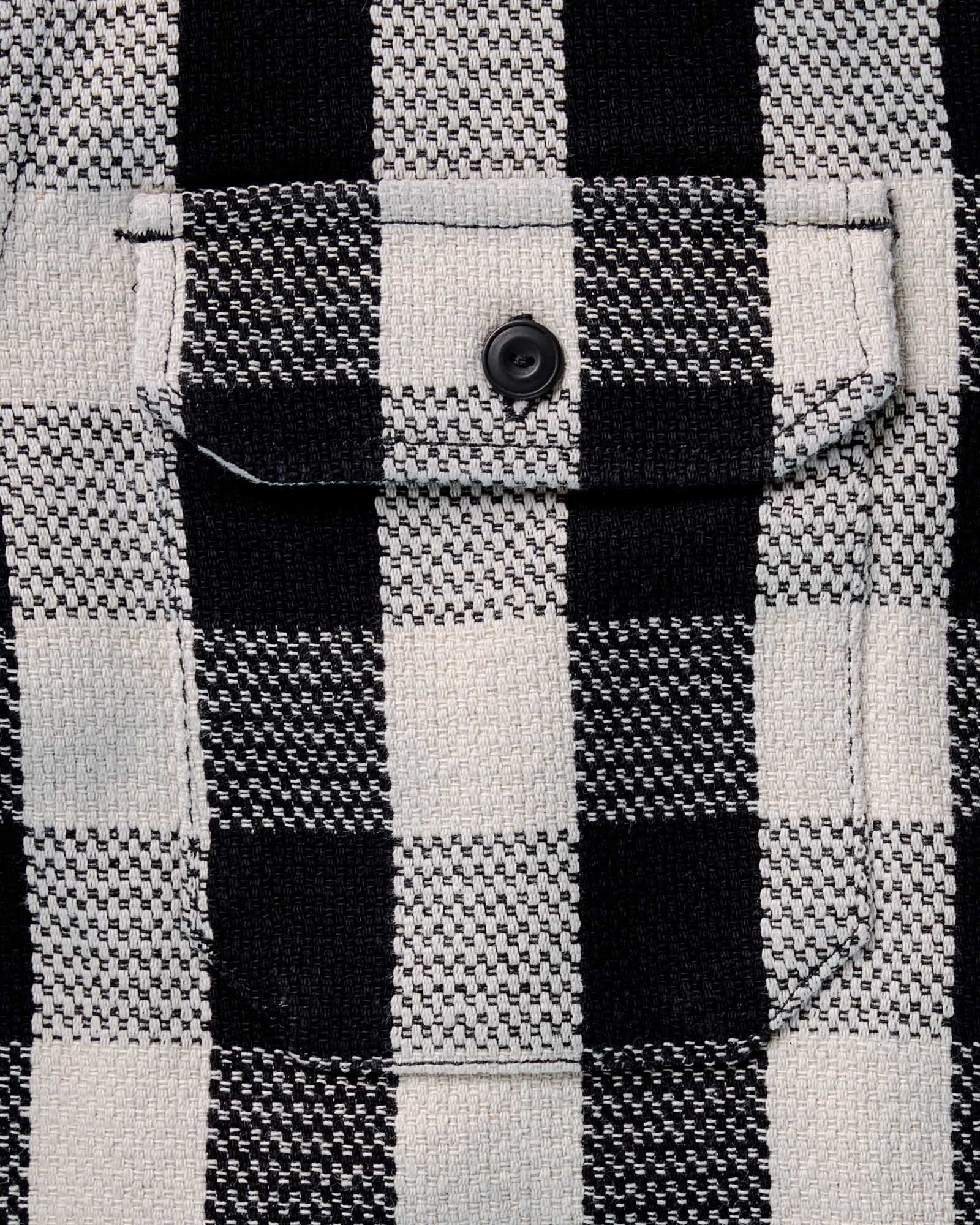 material shot of the pocket on The Division Shirt in Black Indigo Check, Wovens by Taylor Stitch