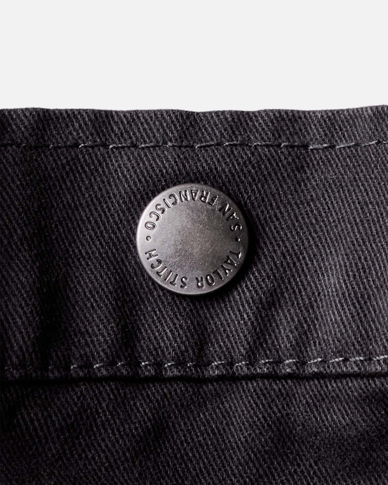 material shot of the button on The Foundation Tote in Organic Faded Black, Accessories by Taylor Stitch