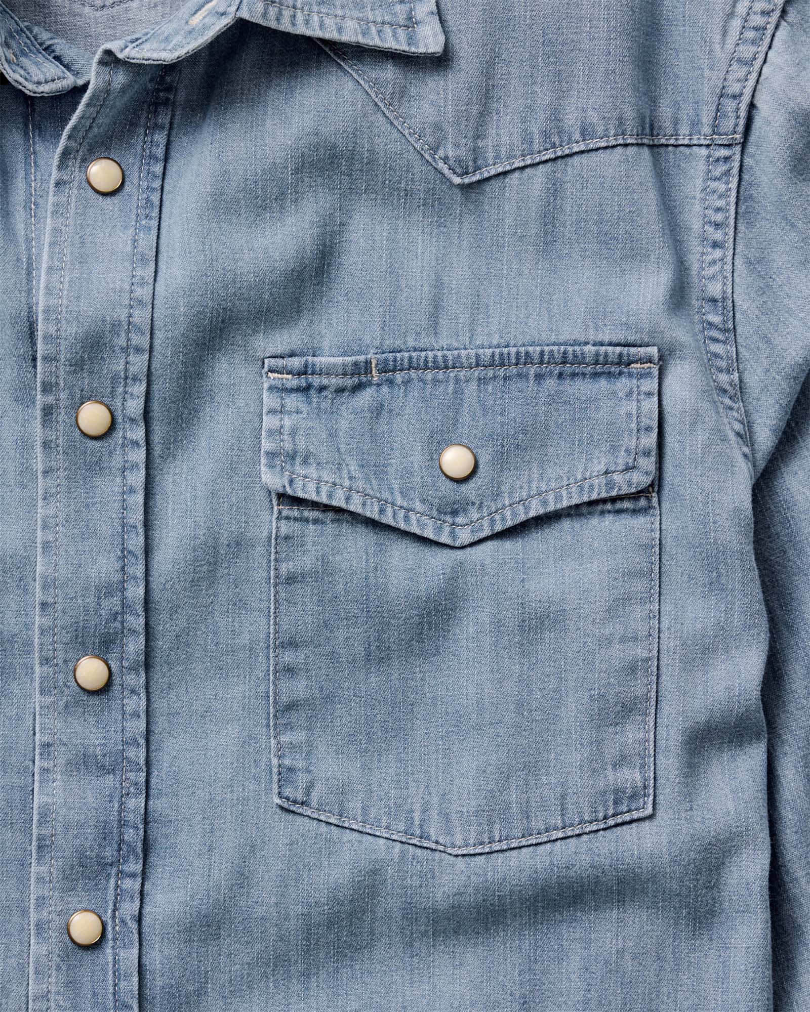 material shot of the pockets on The Glacier Shirt in Washed Indigo Denim, Wovens by Taylor Stitch