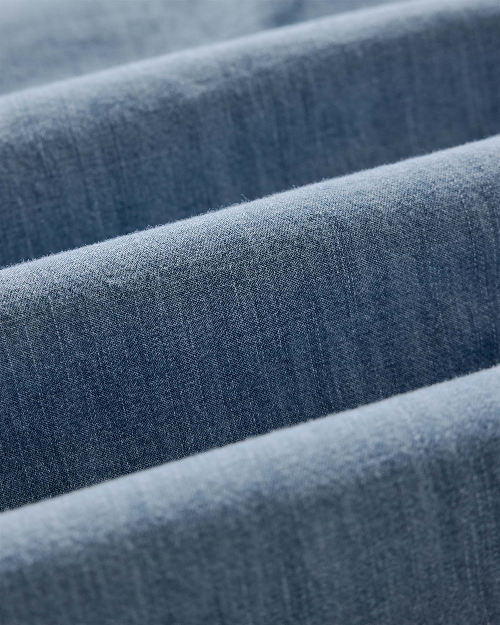 material shot of the fabric on The Glacier Shirt in Washed Indigo Denim, Wovens by Taylor Stitch