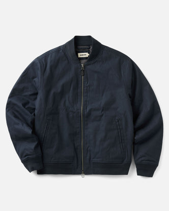 flatlay of The Insulated Bomber Jacket in Dark Navy Dry Wax