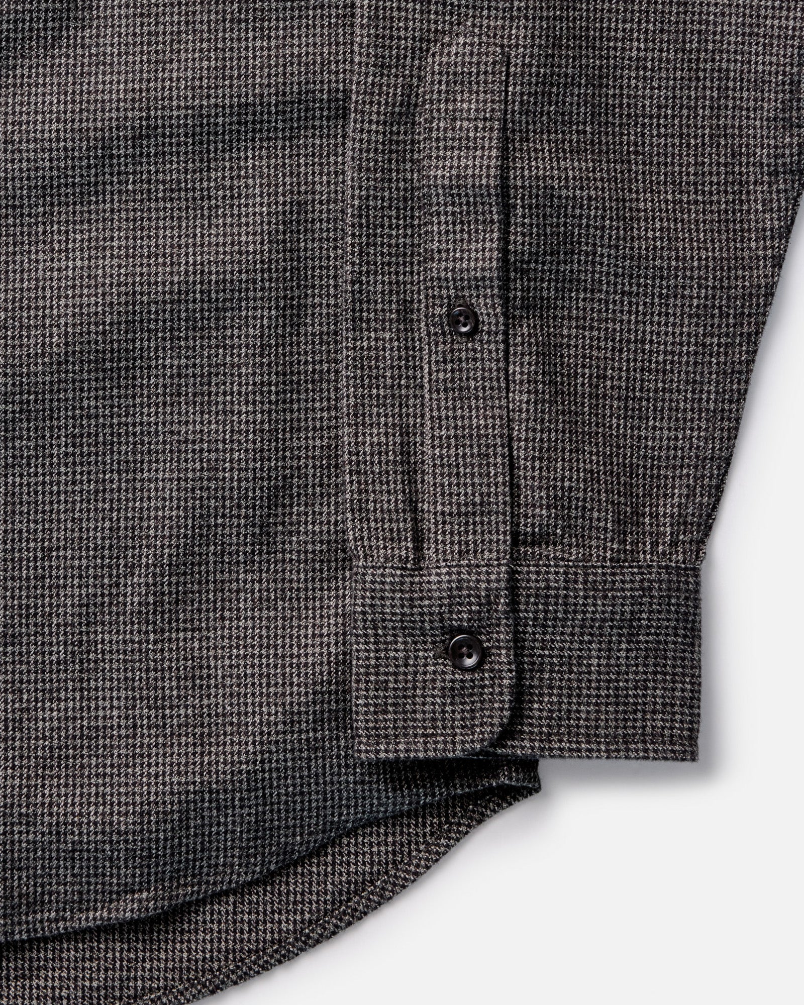 material shot of the cuff on The Jack in Dark Forest Houndstooth, Wovens by Taylor Stitch