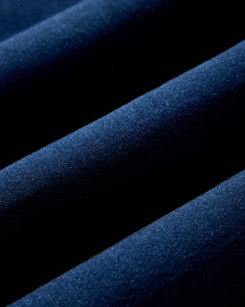material shot of the fabric on The Jack in Rinsed Indigo Oxford, Wovens by Taylor Stitch