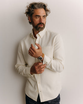 fit model adjusting the cuffs on The Jack in Vintage White Waffle, Wovens by Taylor Stitch
