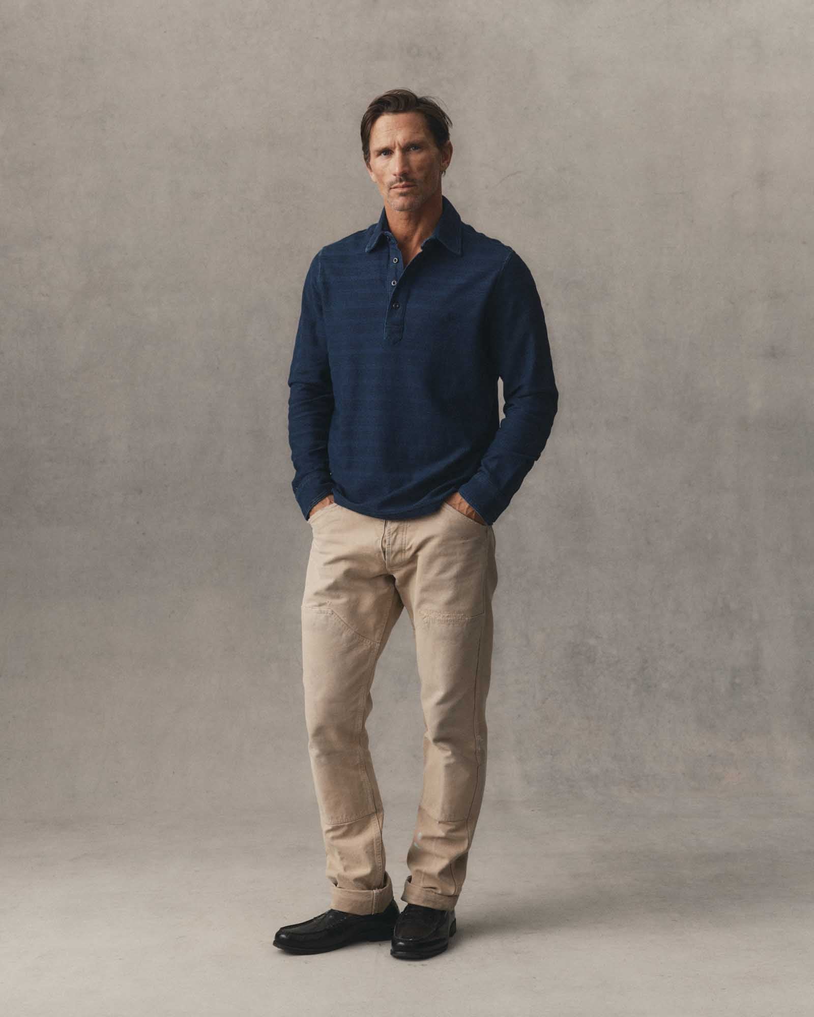 fit model showing off the back collar on The Long Sleeve Polo in Indigo Knit Stripe, Knits by Taylor Stitch