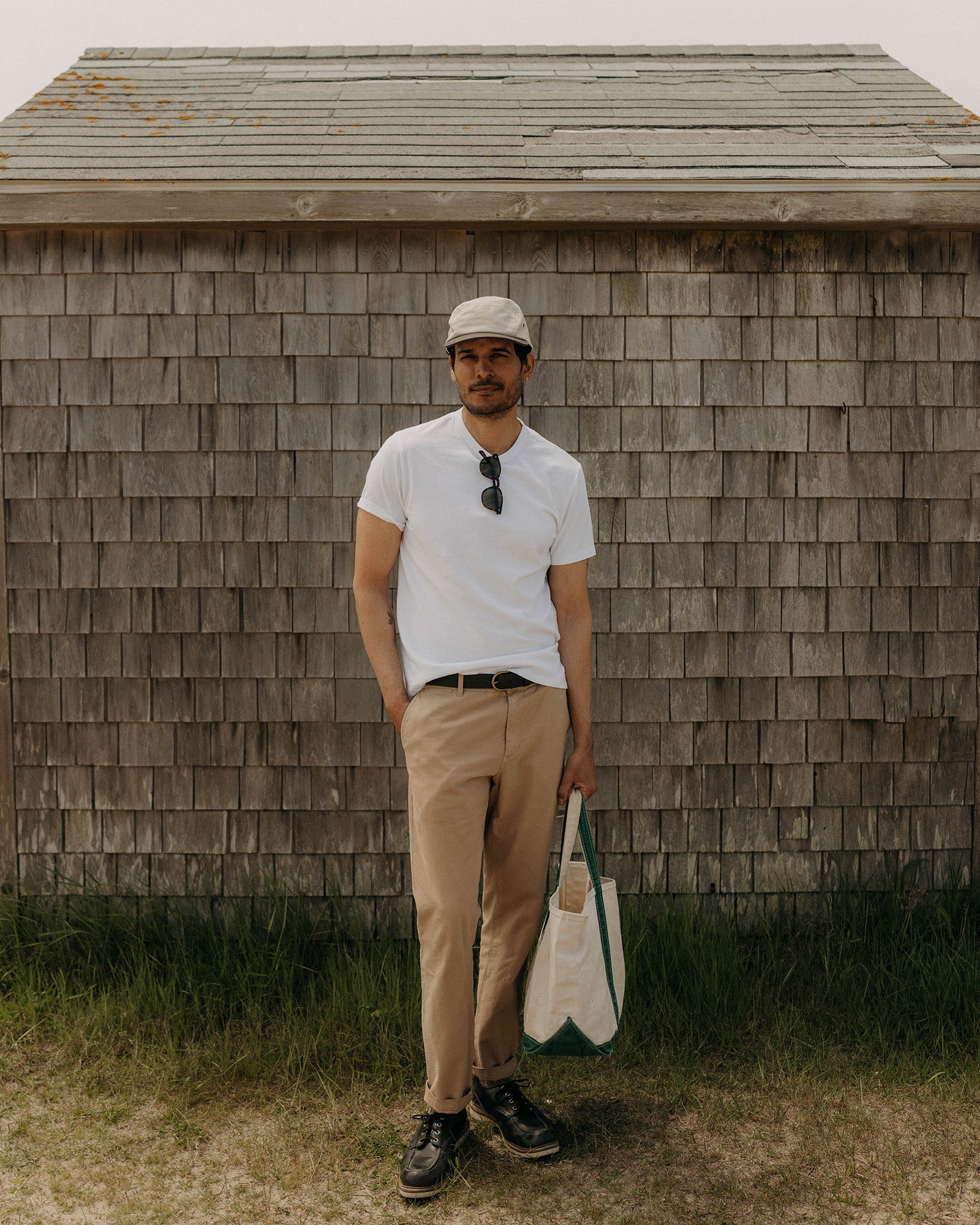 fit model posing in The Organic Cotton Tee in White, Knits by Taylor Stitch