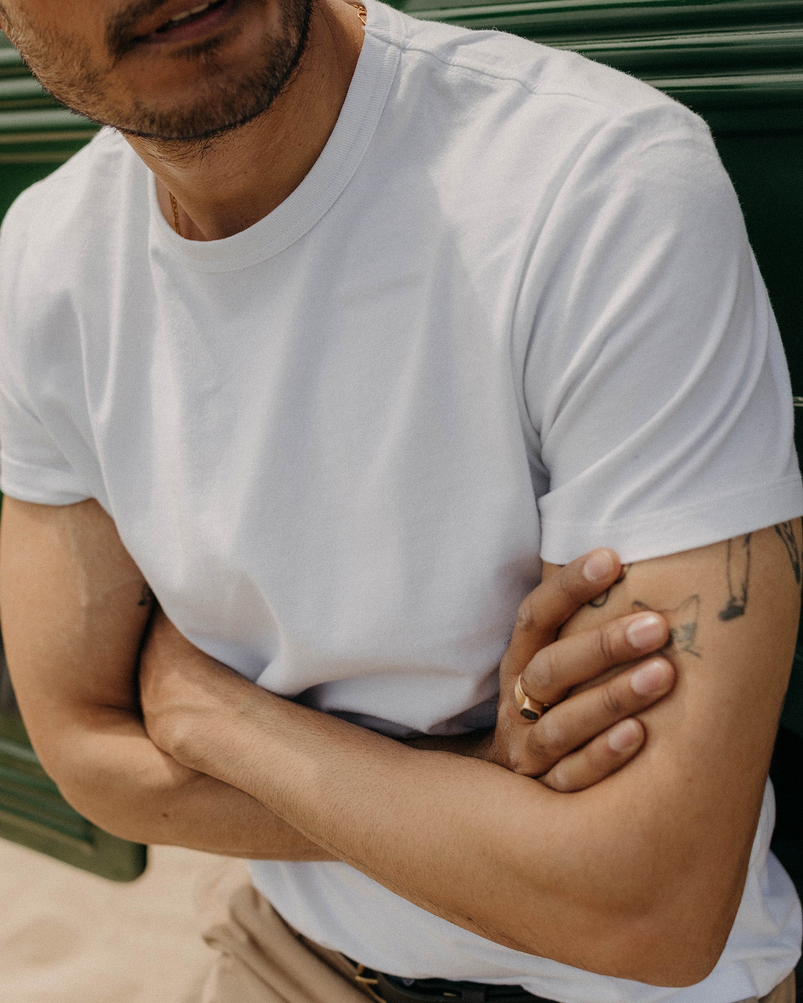 fit model posing in The Organic Cotton Tee in White, Knits by Taylor Stitch