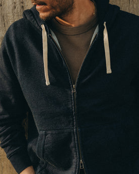 fit model posing in The Apres Zip Hoodie in Rinsed Indigo Terry, Knits by Taylor Stitch