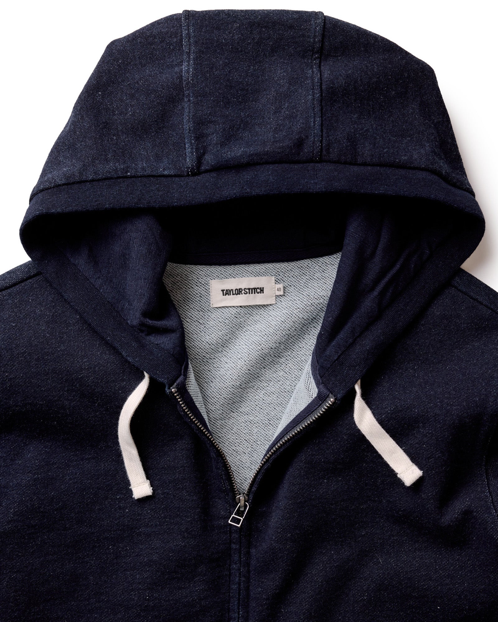 material shot of the hoodie on The Apres Zip Hoodie in Rinsed Indigo Terry, Knits by Taylor Stitch