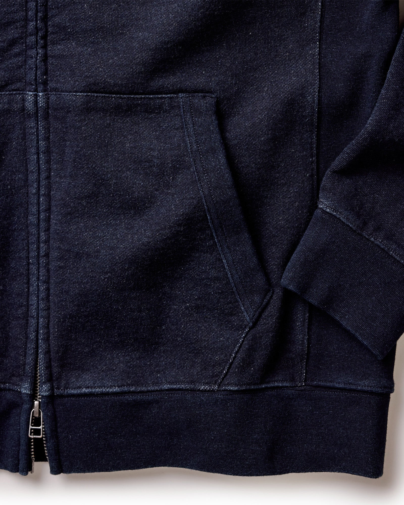 material shot of the pocket on The Apres Zip Hoodie in Rinsed Indigo Terry, Knits by Taylor Stitch