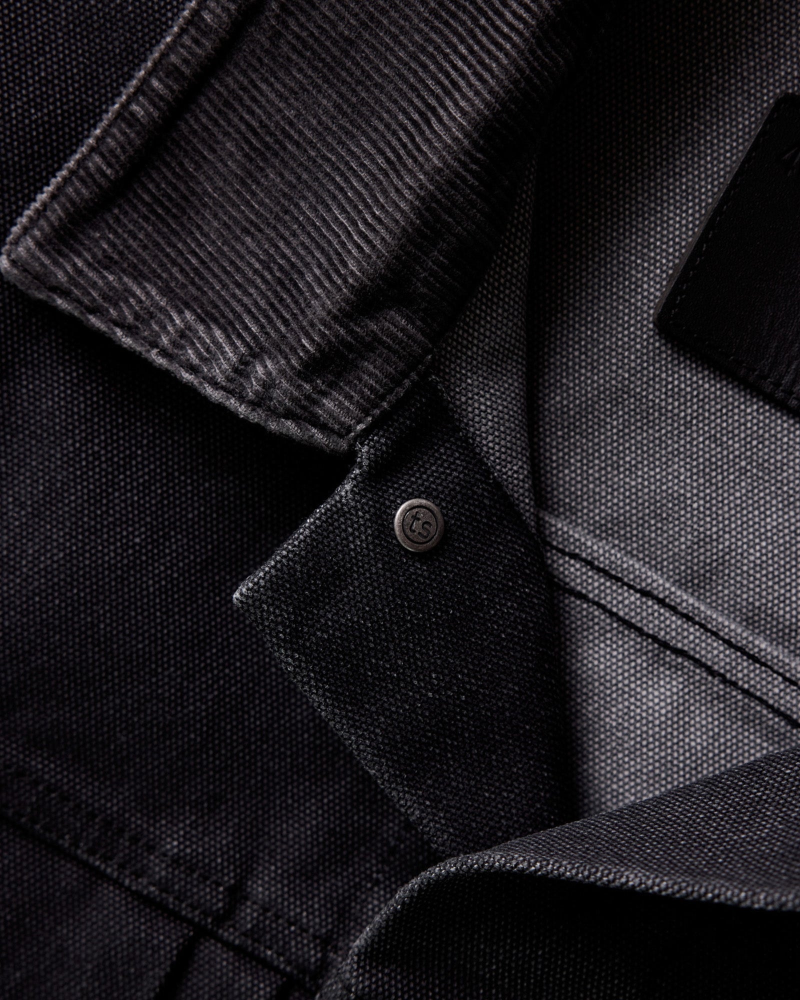material shot of the collar on The Ryder Jacket in Coal Chipped Canvas, Outerwear by Taylor Stitch