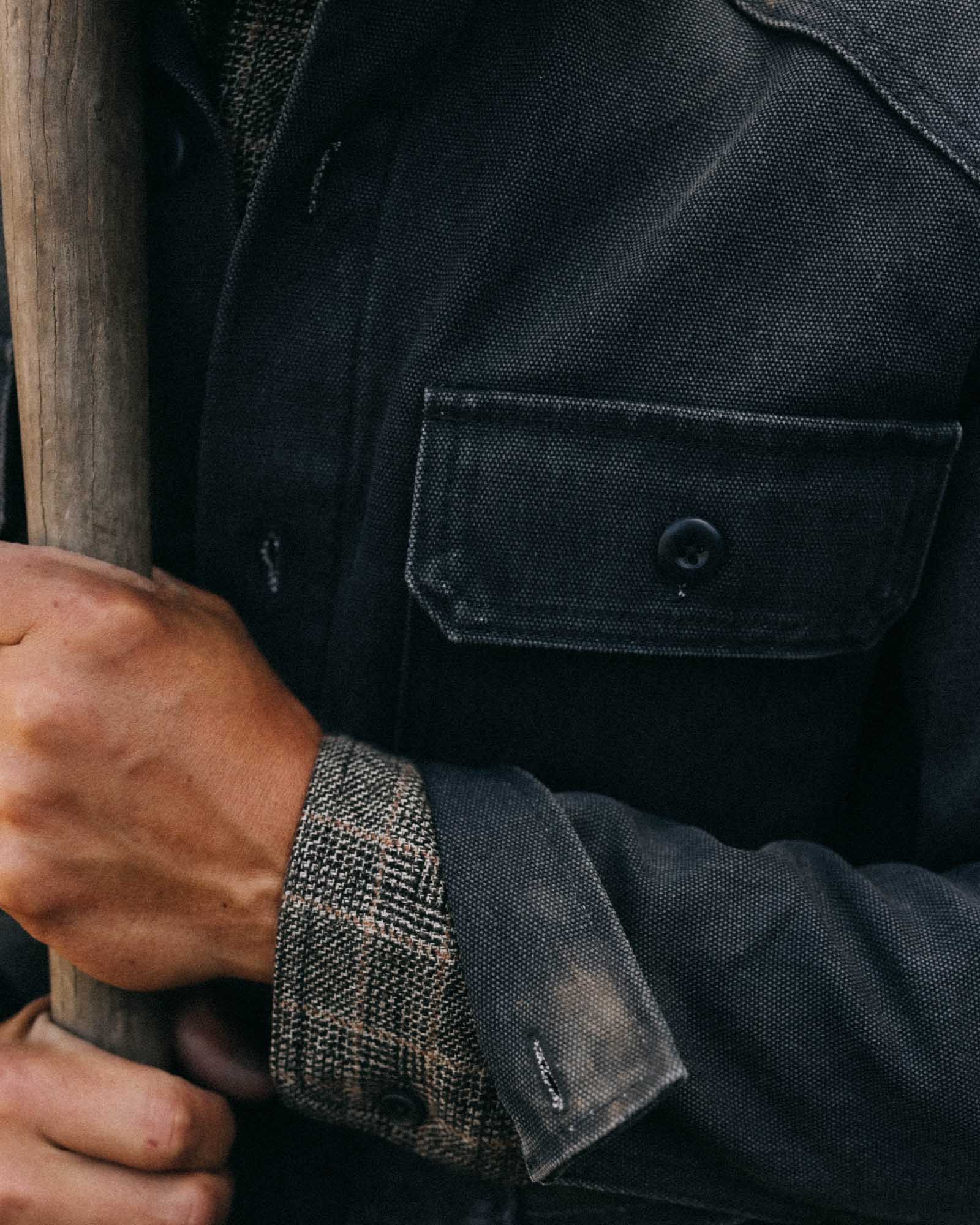 fit model showing off collar on The Shop Shirt in Navy Chipped Canvas, Wovens by Taylor Stitch