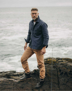 fit model standing wearing The Shop Shirt in Navy Chipped Canvas, Wovens by Taylor Stitch