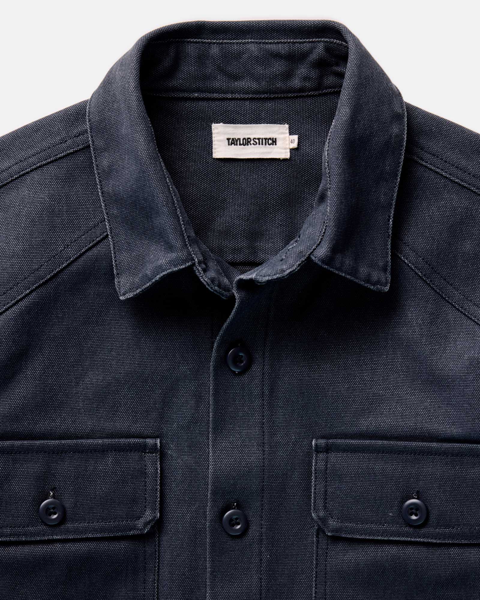 material shot of the collar on The Shop Shirt in Navy Chipped Canvas, Wovens by Taylor Stitch