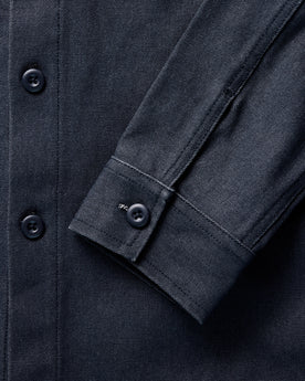 material shot of the sleeve on The Shop Shirt in Navy Chipped Canvas, Wovens by Taylor Stitch
