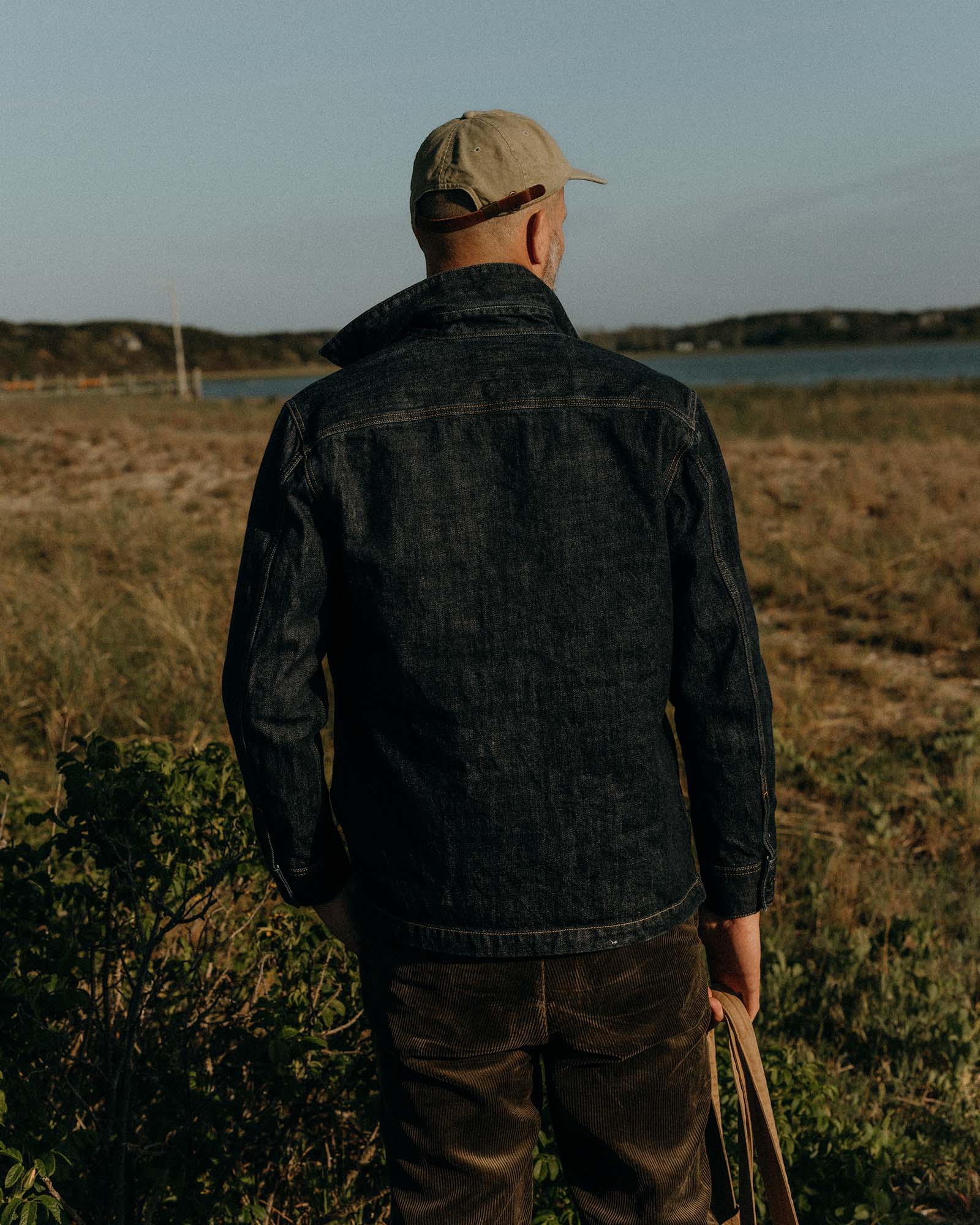 fit model showing off the back of The Shop Shirt in Rinsed Indigo Selvedge, Wovens by Taylor Stitch