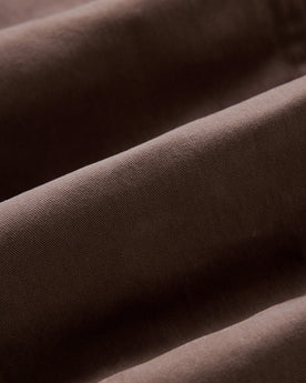 material shot of the twill fabric on The Slim Foundation Pant in Organic Espresso, Bottoms by Taylor Stitch