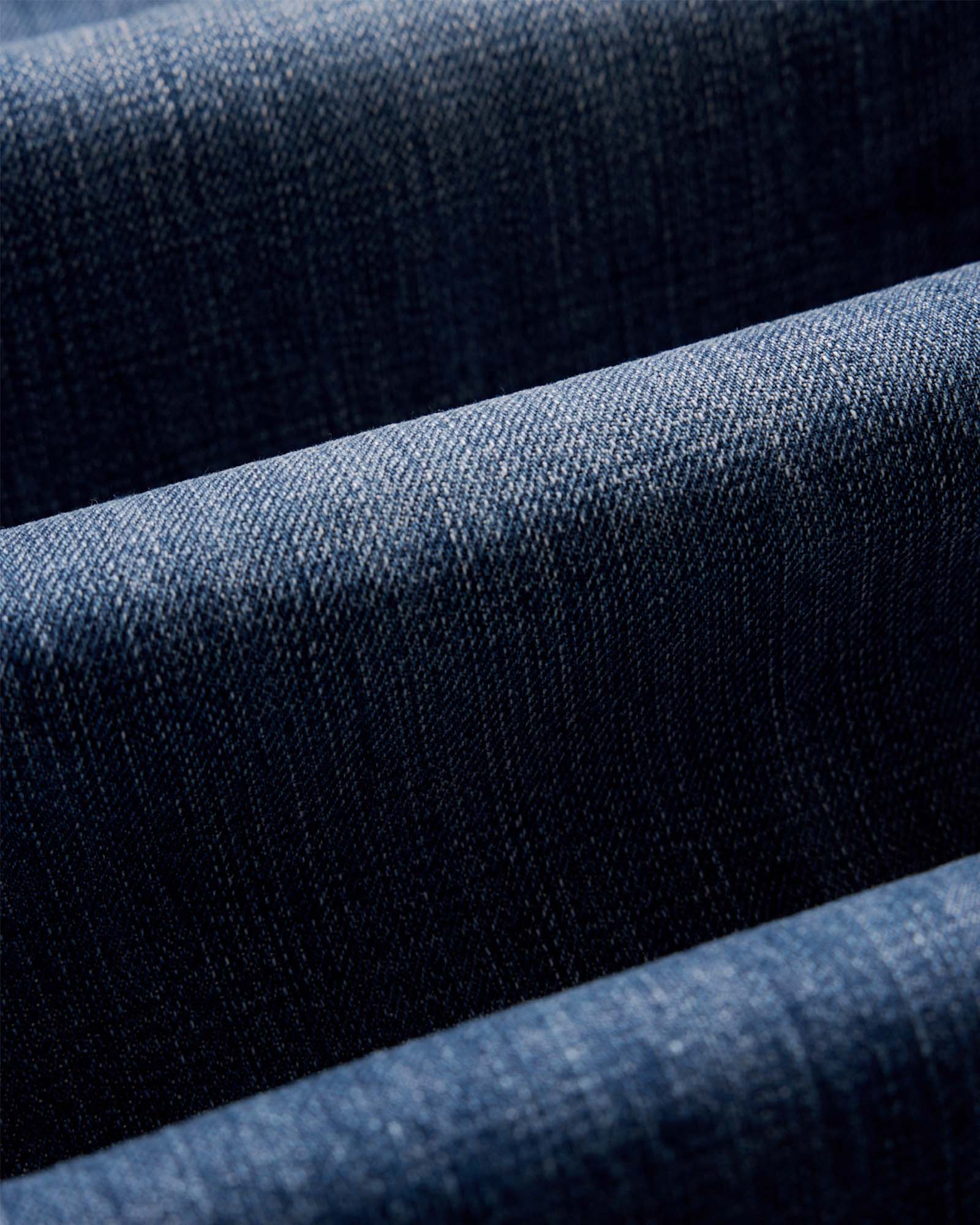 material shot of the fabric on The Straight Jean in Mid Wash Organic Selvedge, Bottoms by Taylor Stitch