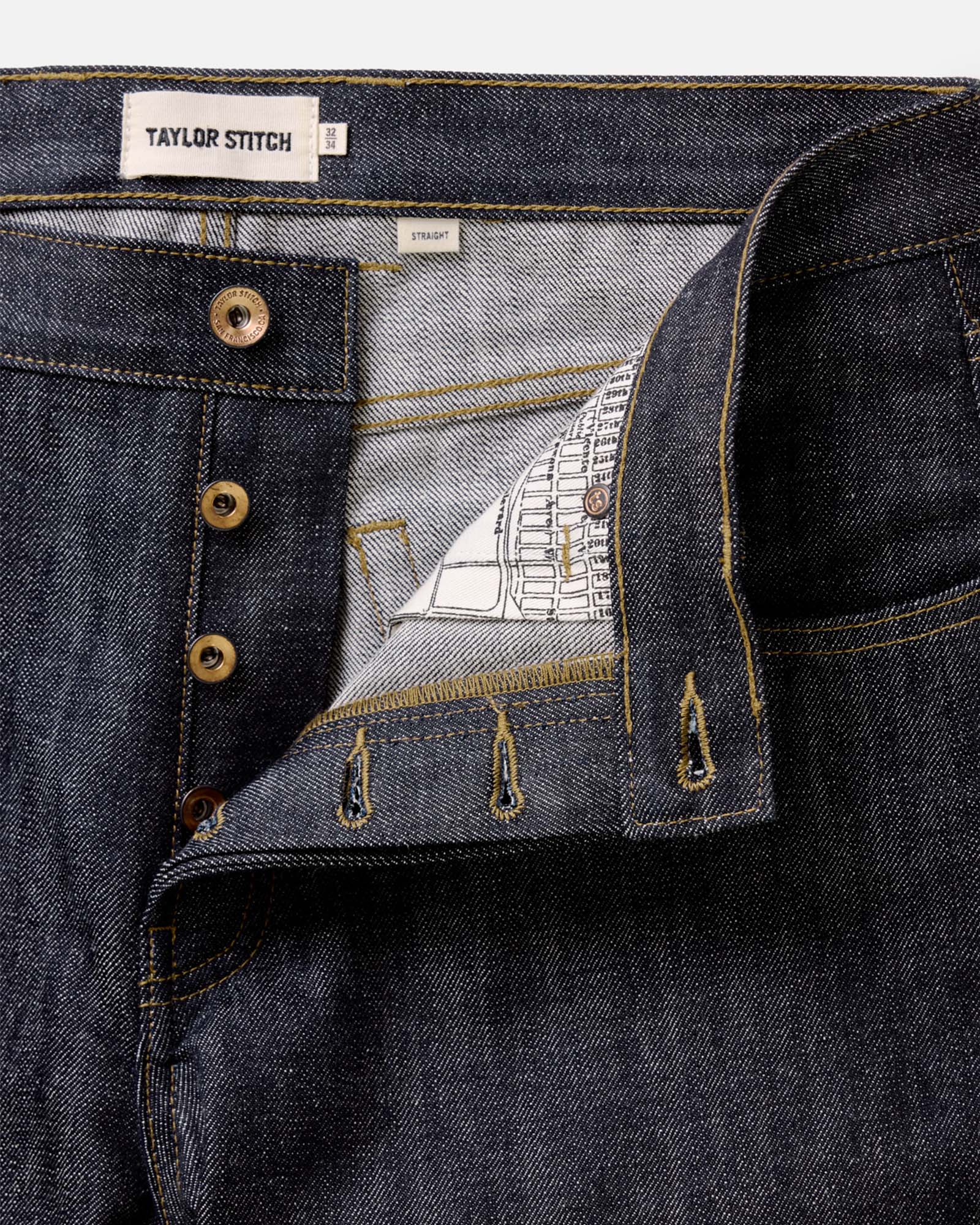 material shot of the buttons on The Straight Jean in Rigid Organic Selvedge, Bottoms by Taylor Stitch