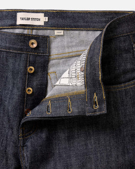 material shot of the buttons on The Straight Jean in Rigid Organic Selvedge, Bottoms by Taylor Stitch