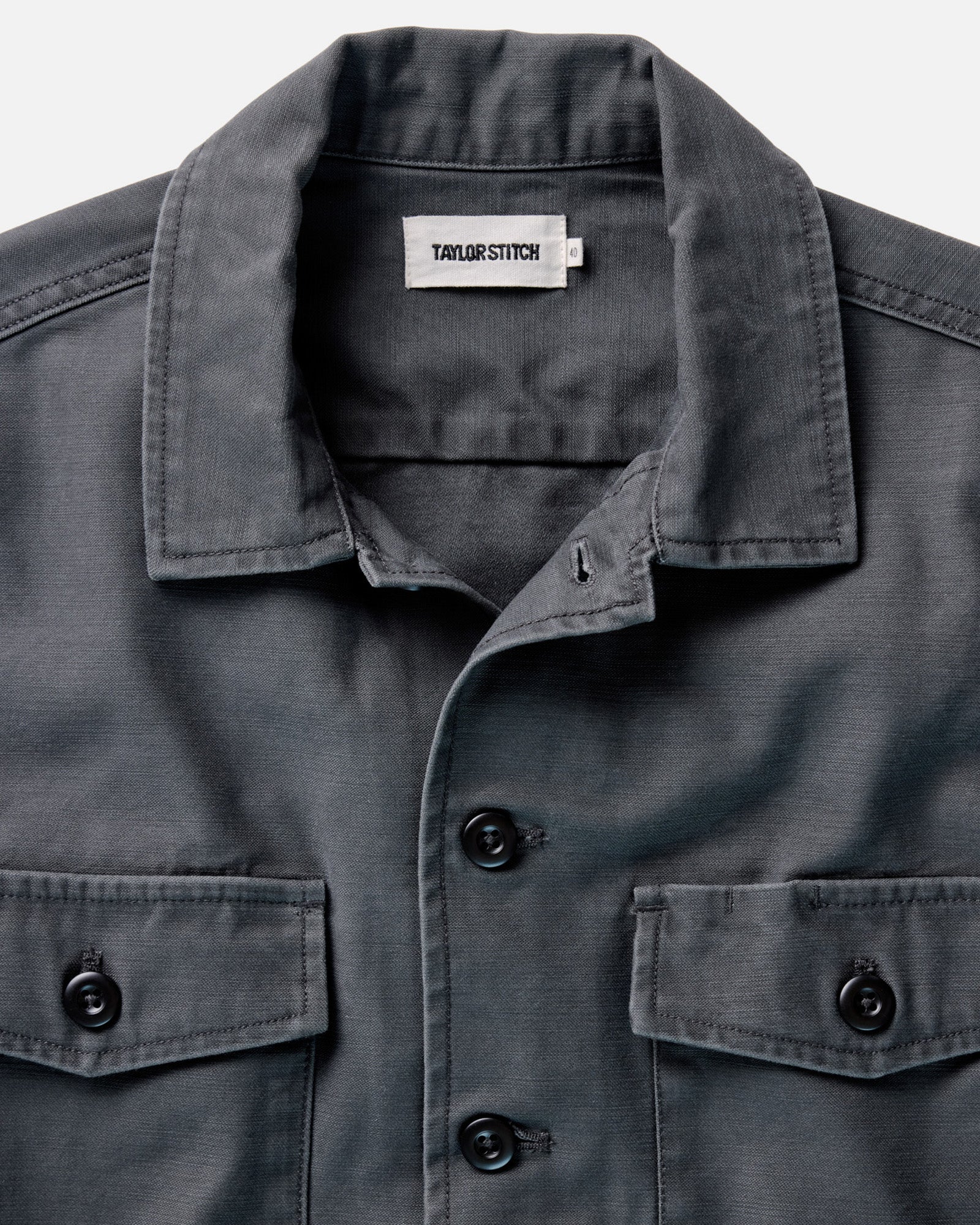 material shot of the collar on The Surplus Shirt in Faded Black Reverse Sateen, Wovens by Taylor Stitch