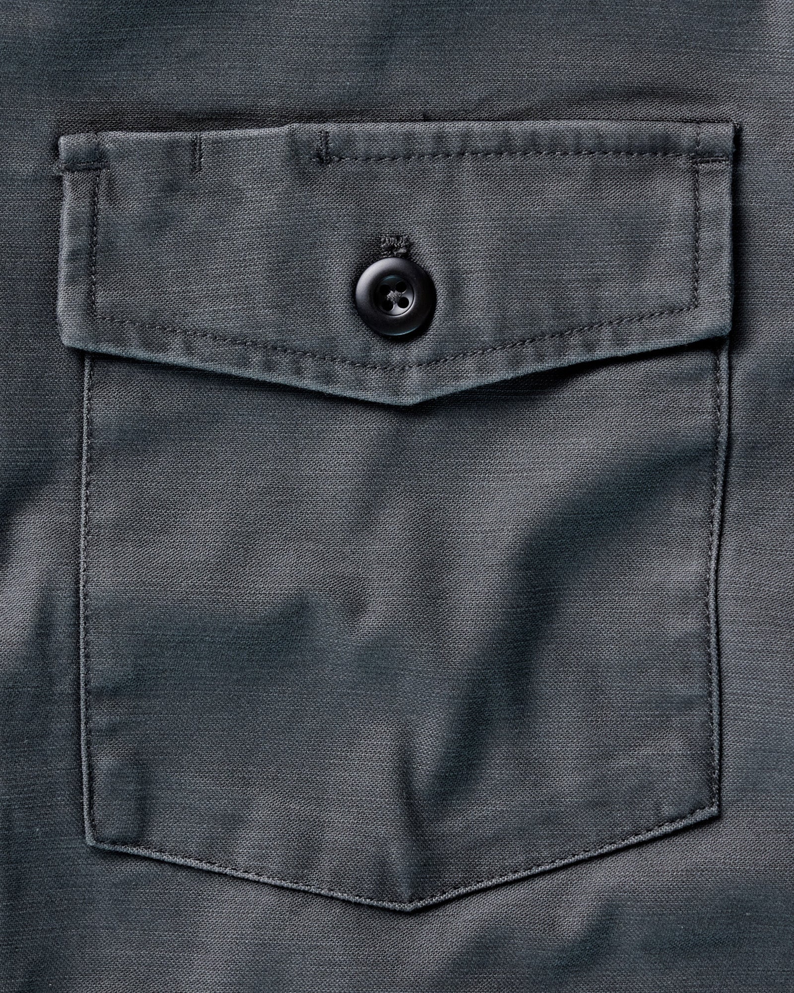 material shot of the pocket on The Surplus Shirt in Faded Black Reverse Sateen, Wovens by Taylor Stitch