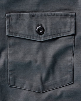 material shot of the pocket on The Surplus Shirt in Faded Black Reverse Sateen, Wovens by Taylor Stitch