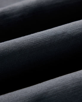 material shot of the fabric on The Surplus Shirt in Faded Black Reverse Sateen, Wovens by Taylor Stitch