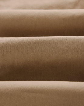 material shot of the twill on The Slim Foundation Pant in Organic Khaki, Bottoms by Taylor Stitch