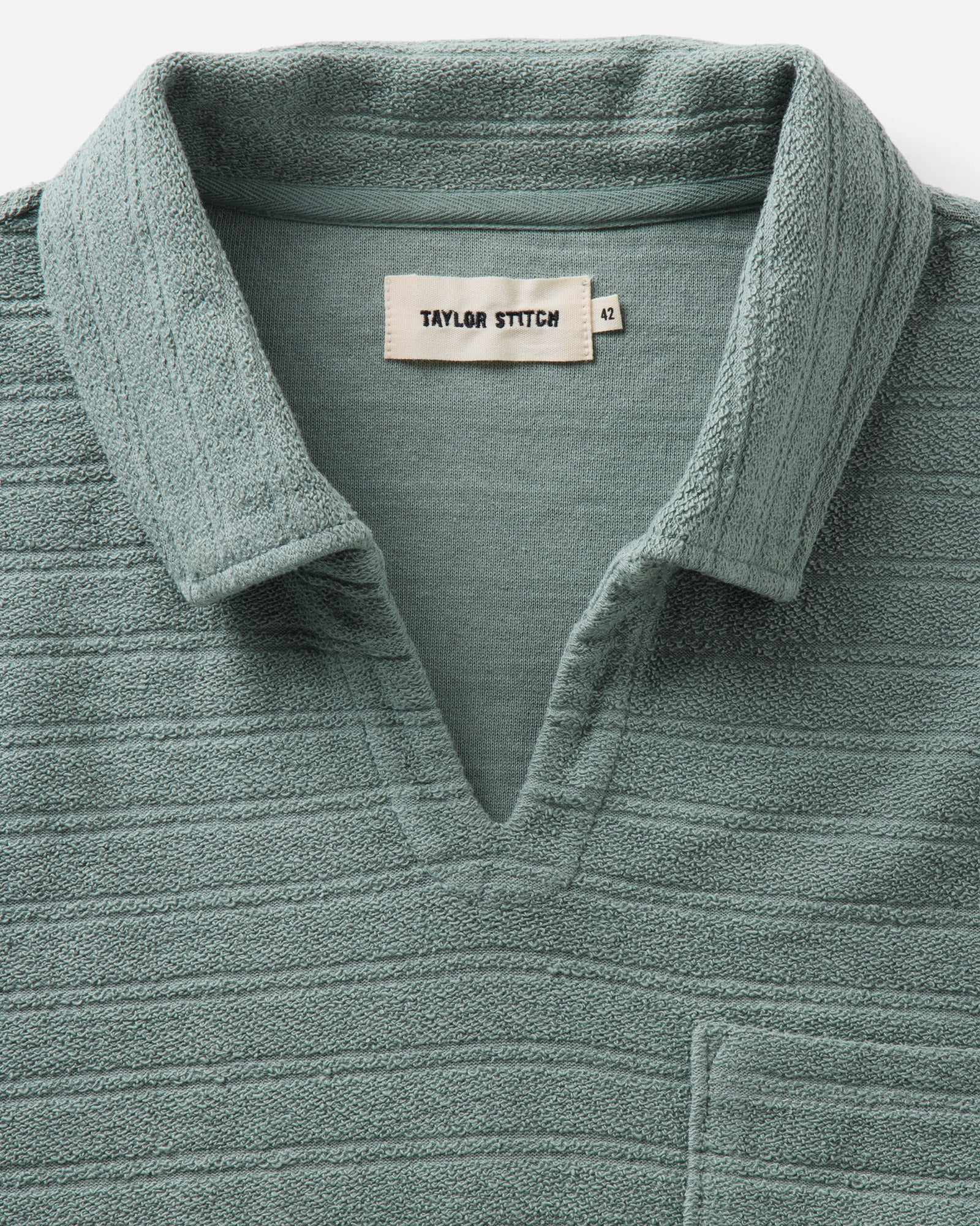 material shot of the collar on The Meridian Polo in Faded Pine, Knits by Taylor Stitch