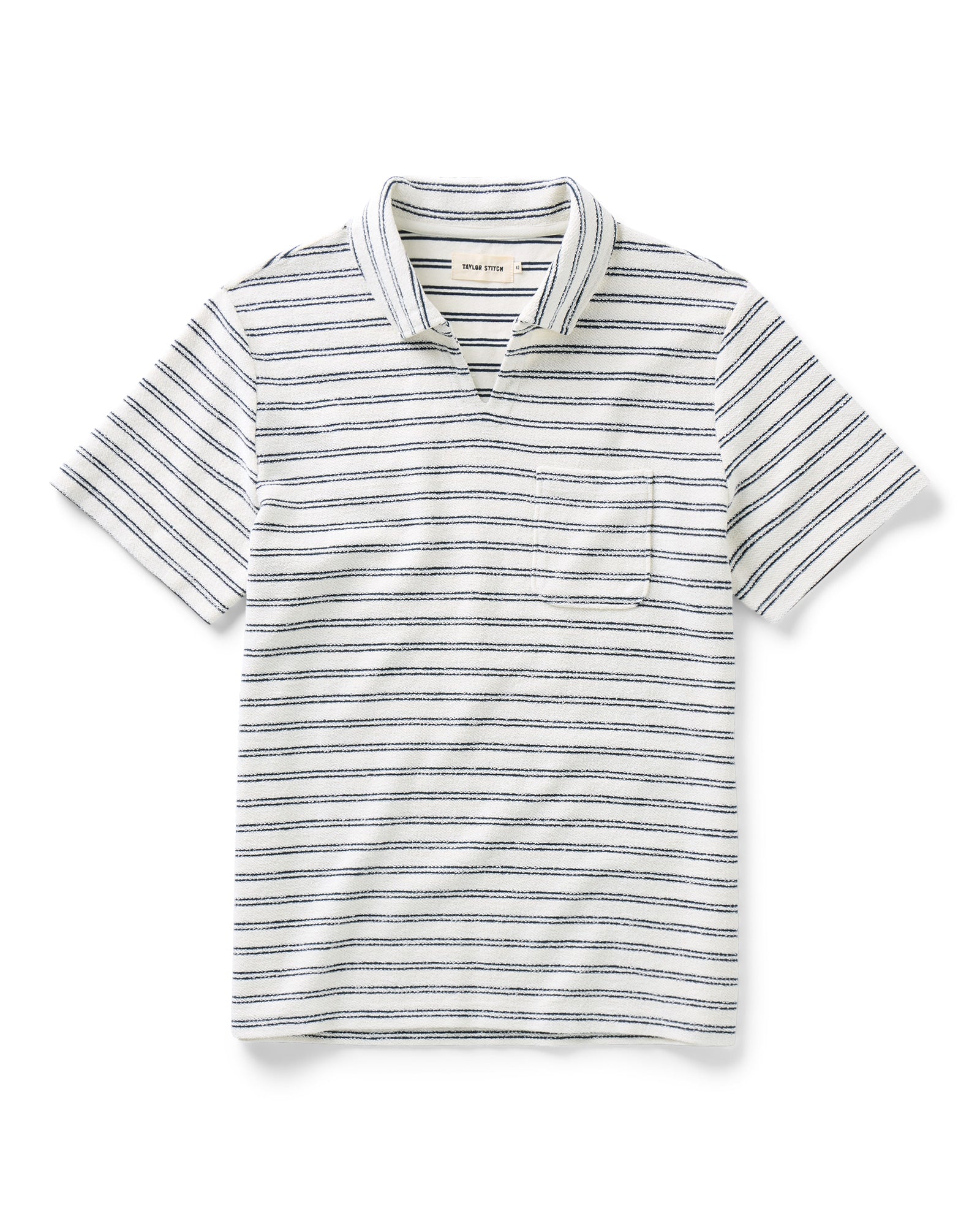 flatlay of The Meridian Polo in Marine Stripe, Knits by Taylor Stitch