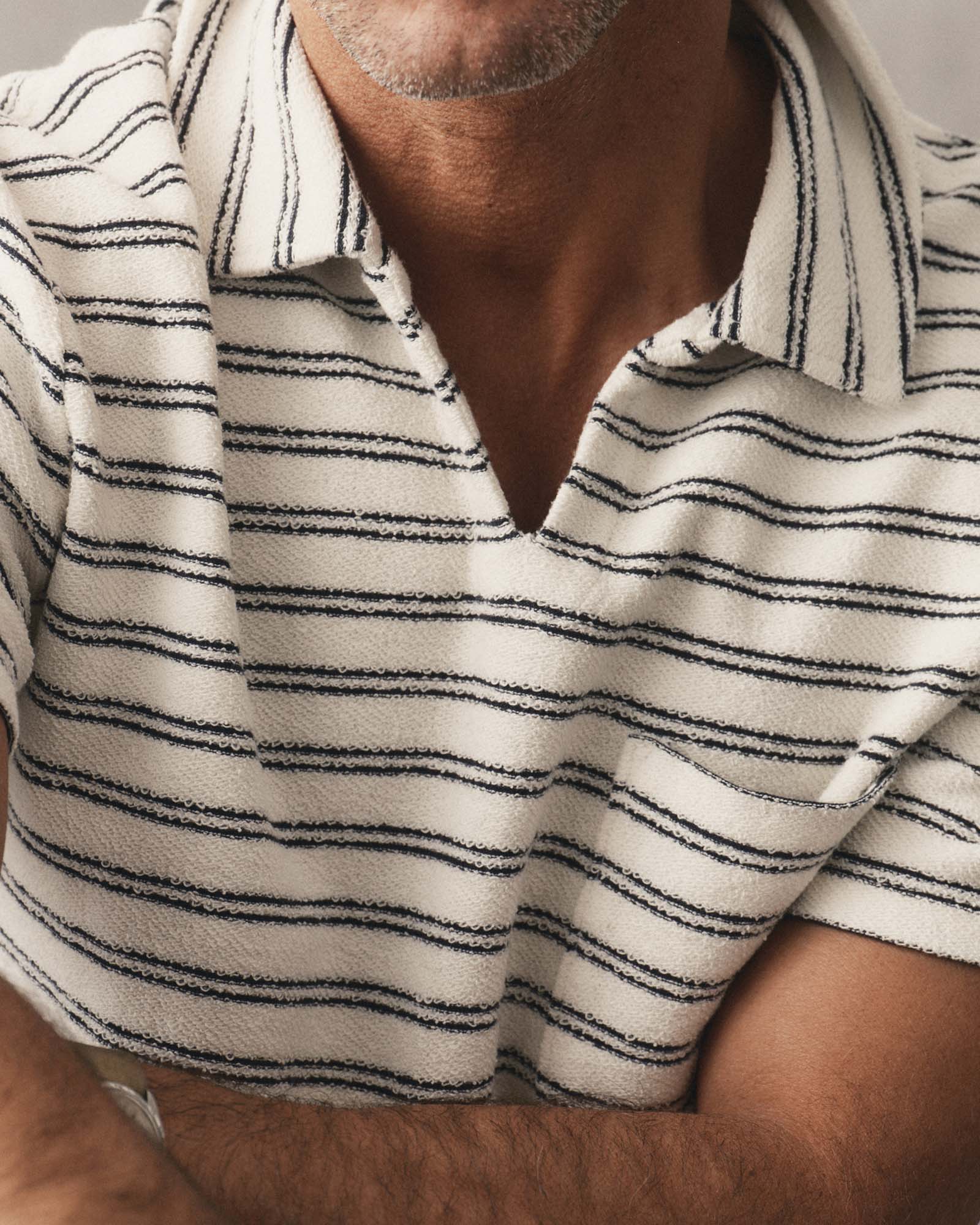 fit model showing off The Meridian Polo in Marine Stripe, Knits by Taylor Stitch