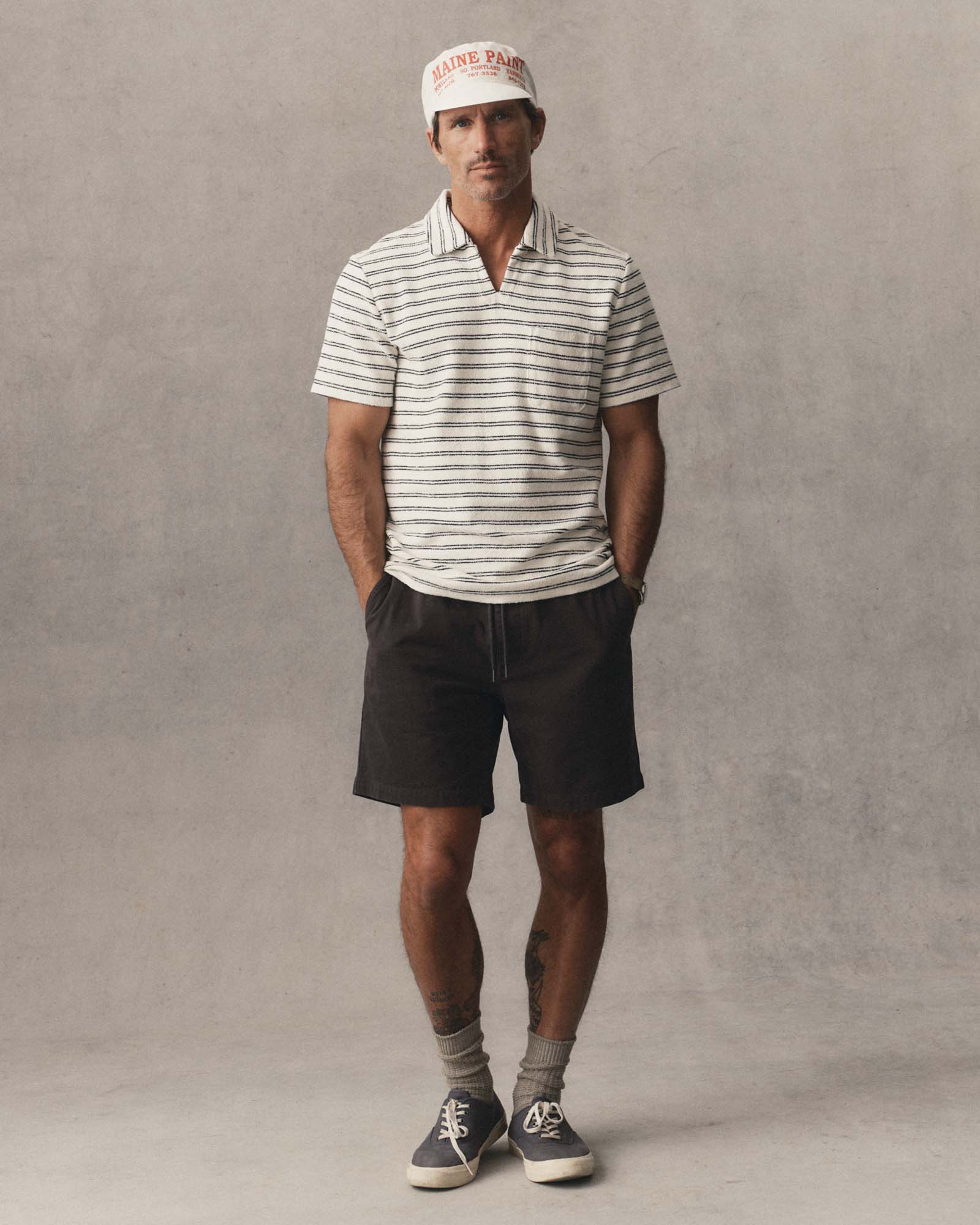 fit model showing off The Meridian Polo in Marine Stripe, Knits by Taylor Stitch