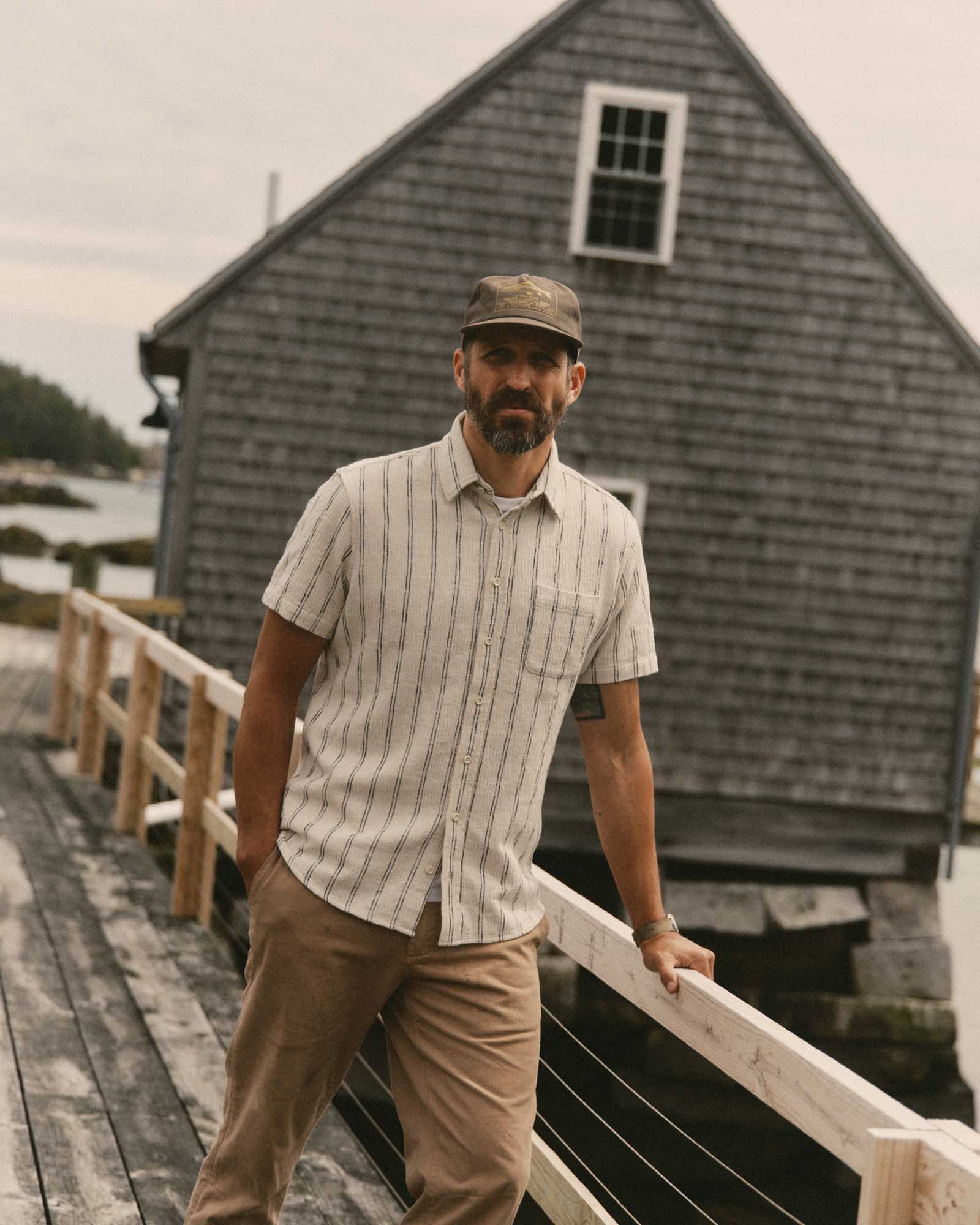 fit model walking wearing The Short Sleeve California in Tide Stripe Hacci, Wovens by Taylor Stitch