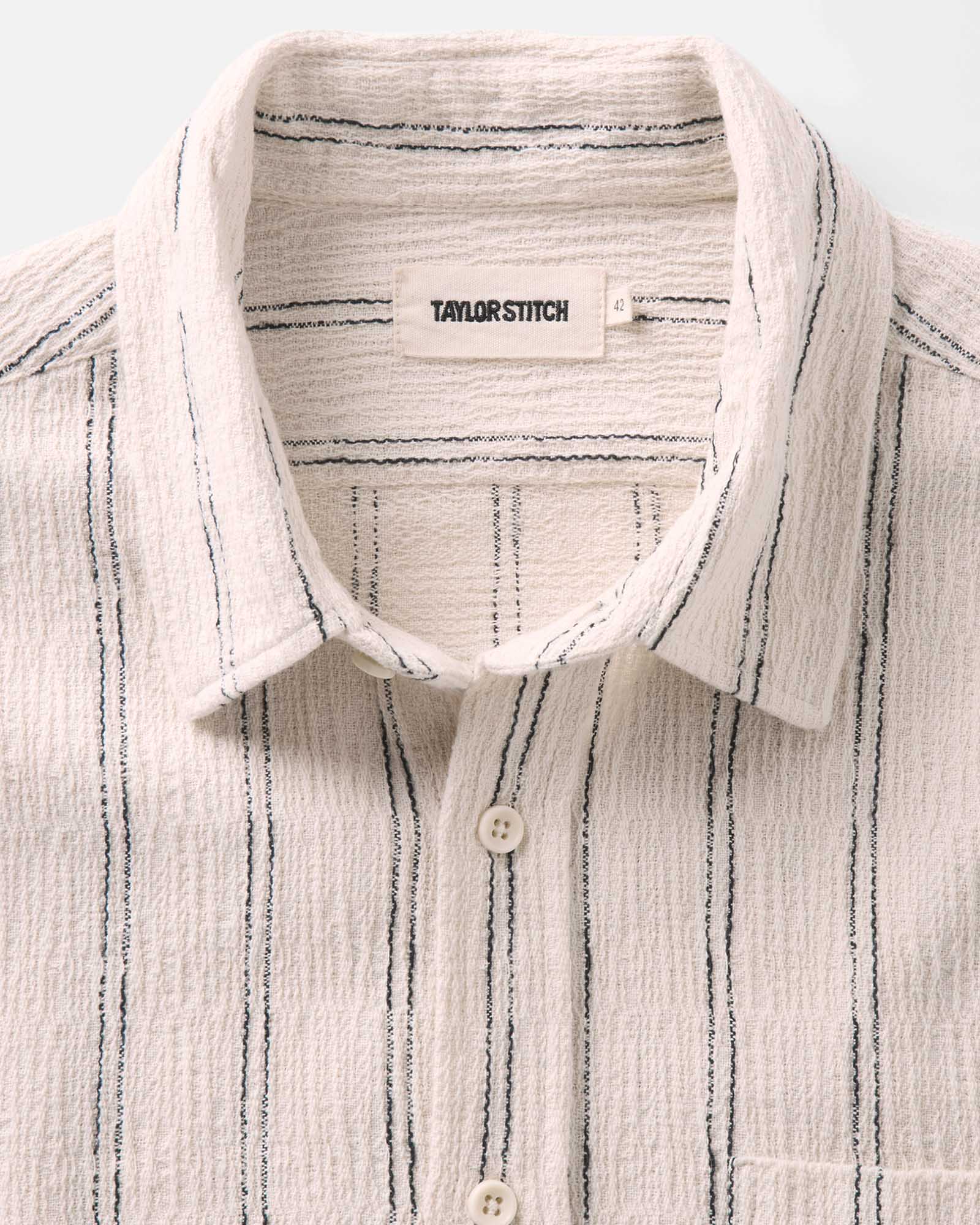 material shot of the collar on The Short Sleeve California in Tide Stripe Hacci, Wovens by Taylor Stitch