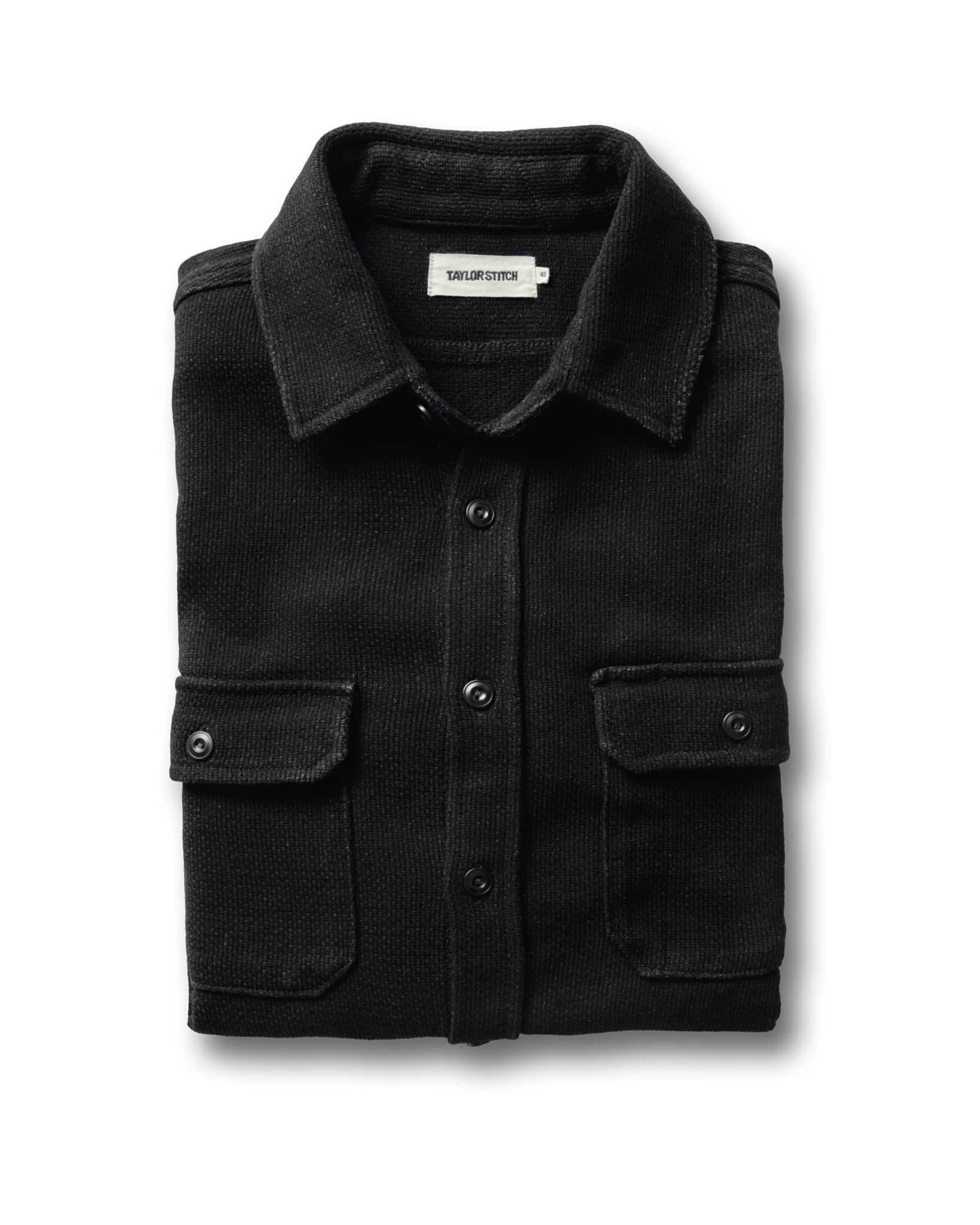folded flatlay of The Division Shirt in Black Indigo, Wovens by Taylor Stitch