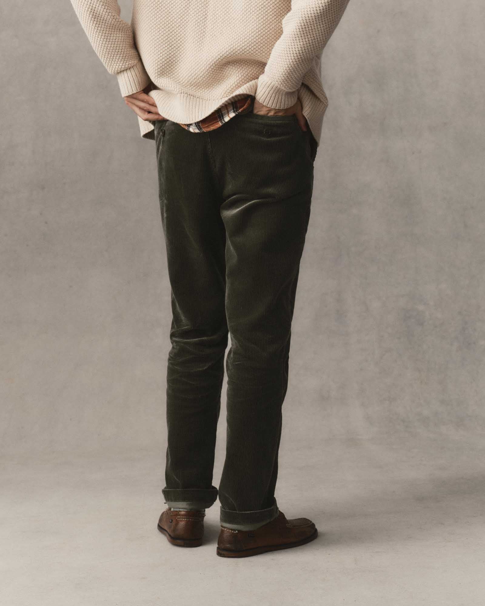 fit model showing off the back pockets on The Carnegie Pant in Smoked Olive Corduroy, Bottoms by Taylor Stitch