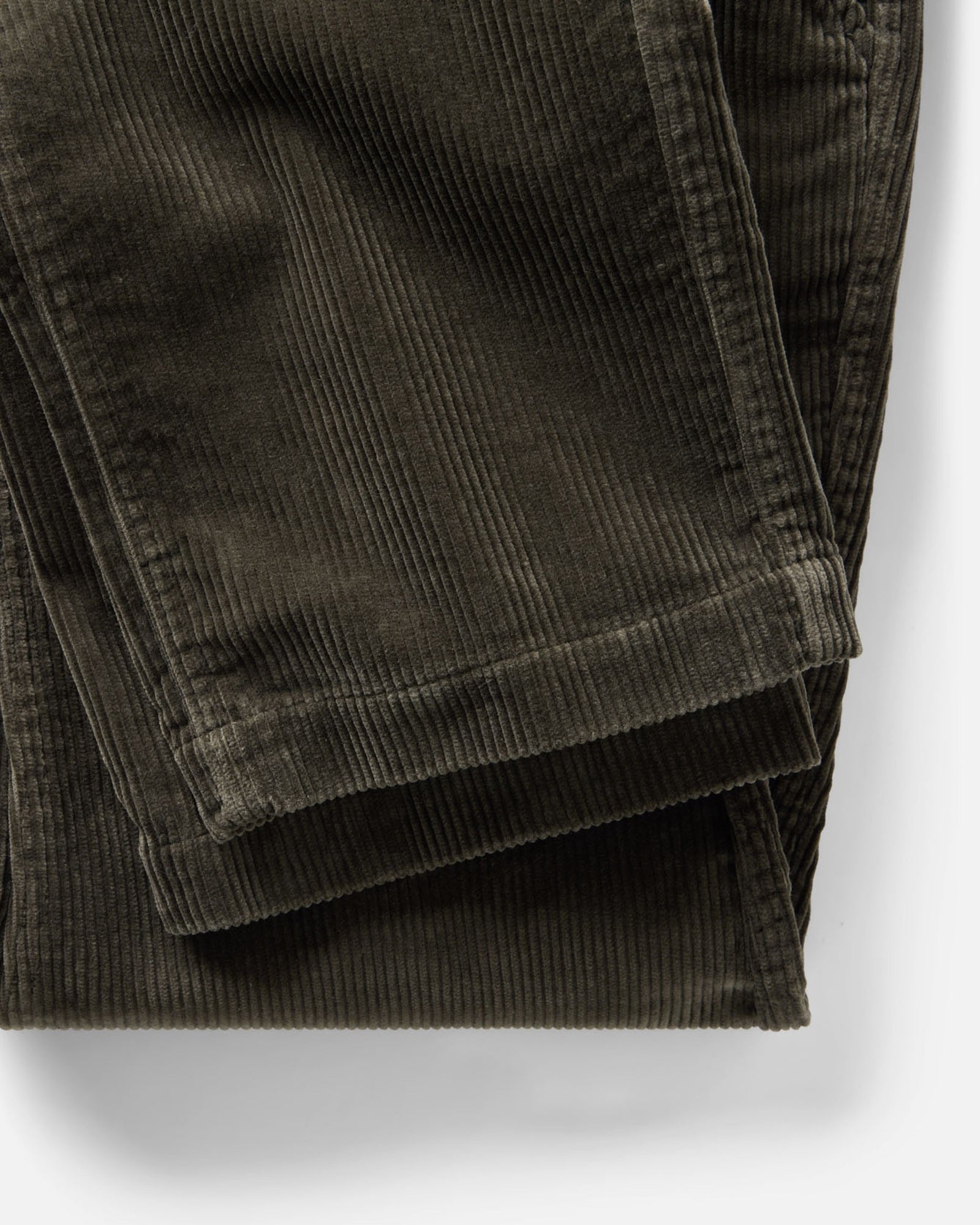 material shot of the hem on The Carnegie Pant in Smoked Olive Corduroy, Bottoms by Taylor Stitch