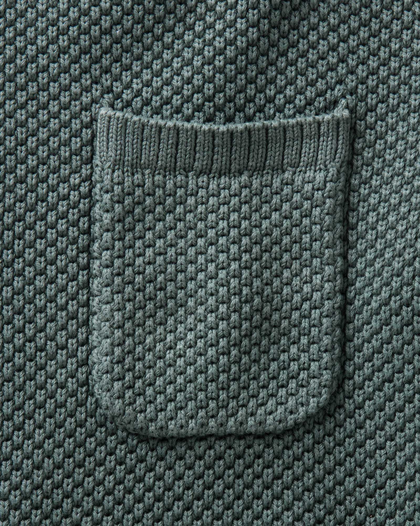 material shot of the pocket on The Crawford Crew Sweater in Faded Spruce, Knits by Taylor Stitch