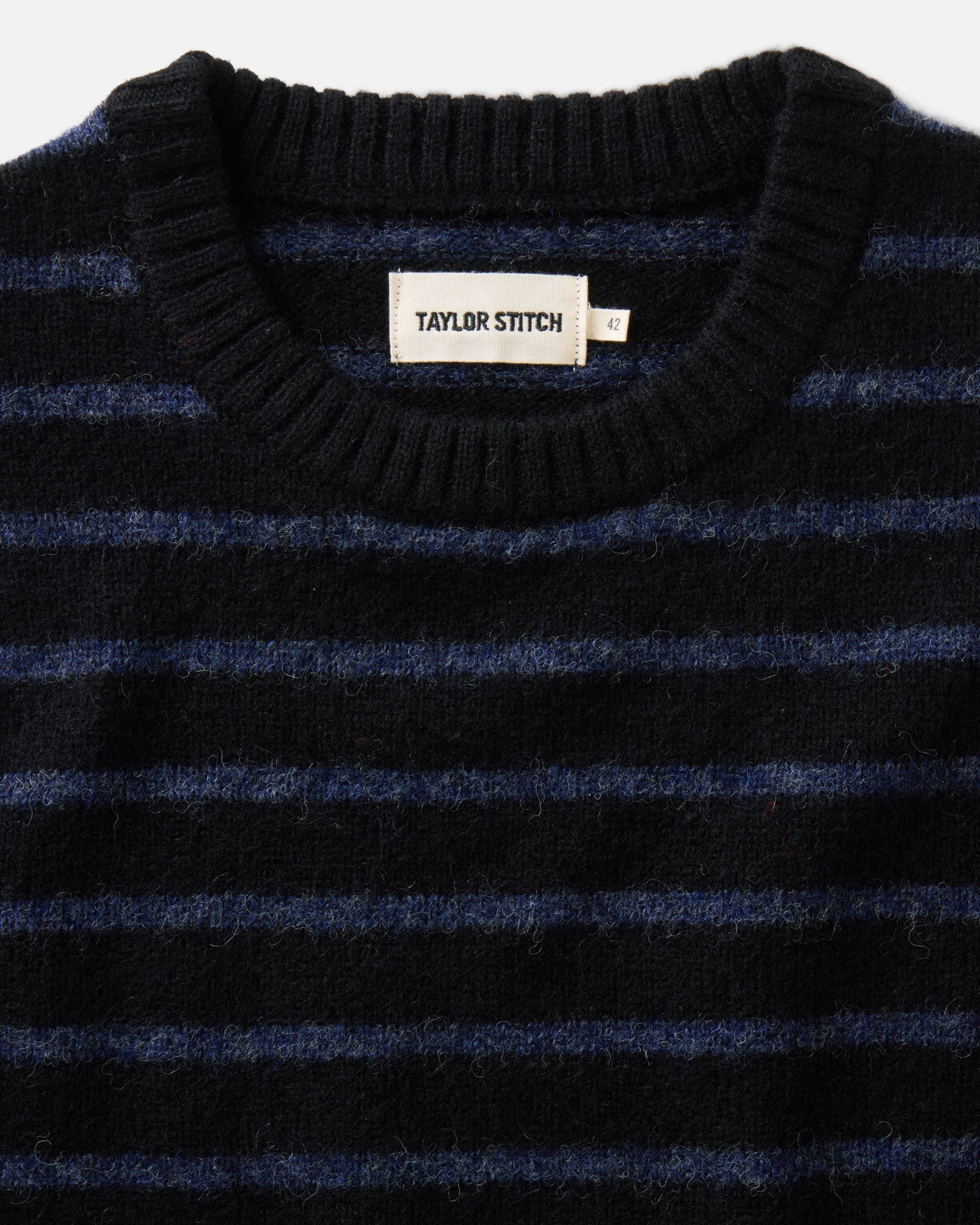 material shot of the collar on The Eastmoor Sweater in Coal Stripe Wool, Knits by Taylor Stitch