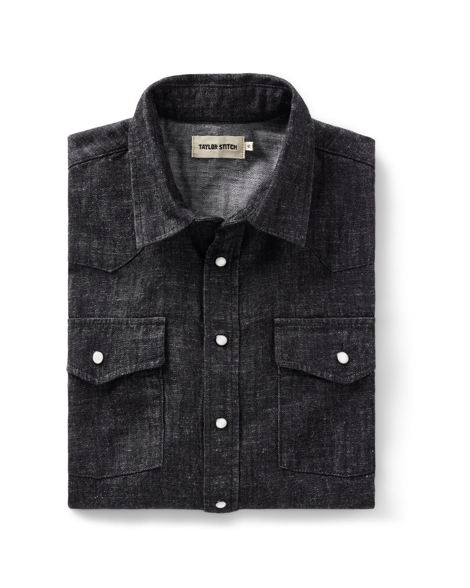 folded flatlay of The Glacier Shirt in Black Indigo Hemp Denim, Wovens by Taylor Stitch
