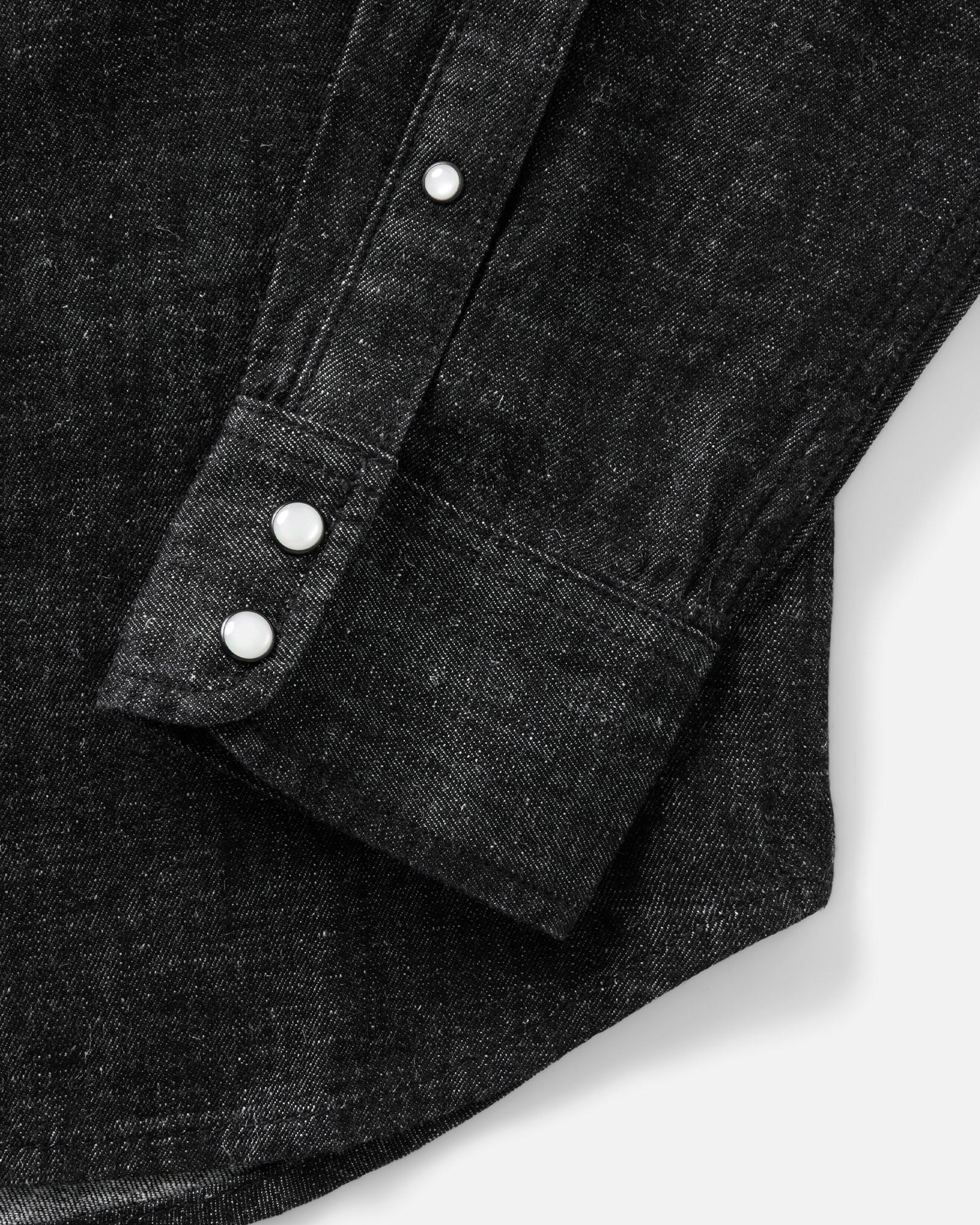 material shot of the sleeve on The Glacier Shirt in Black Indigo Hemp Denim, Wovens by Taylor Stitch