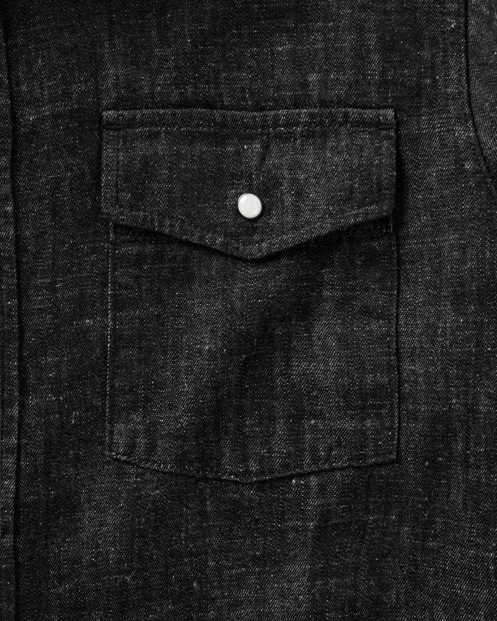 material shot of the pocket on The Glacier Shirt in Black Indigo Hemp Denim, Wovens by Taylor Stitch