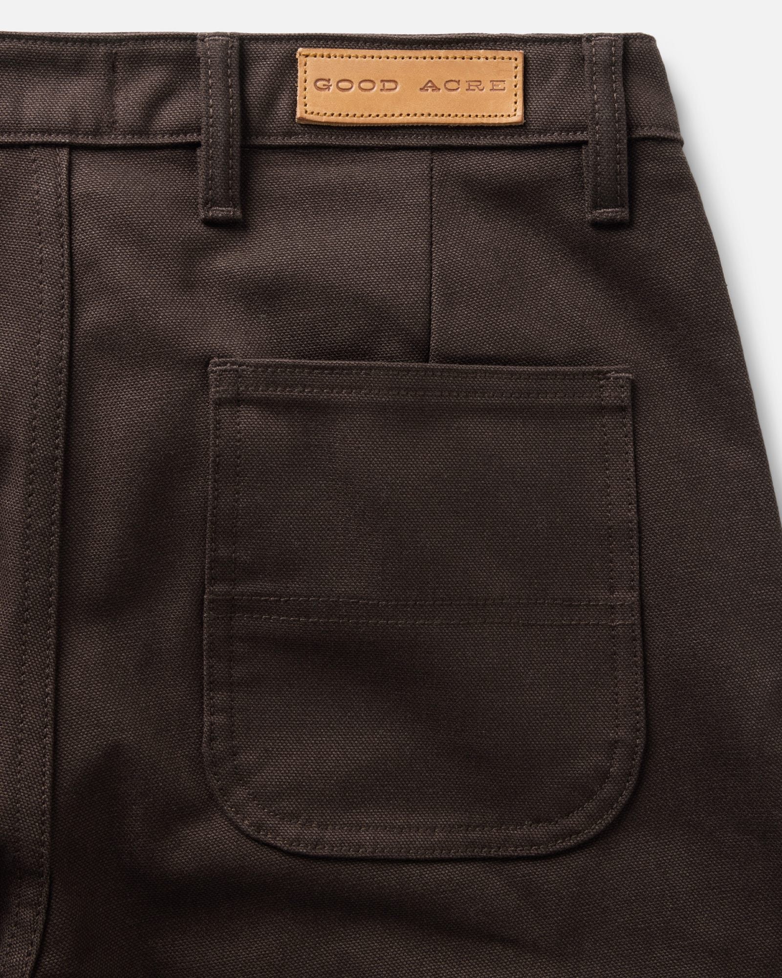 material shot of the back pocket on The Good Acre Chore Pant in Coffee Canvas, Bottoms by Taylor Stitch