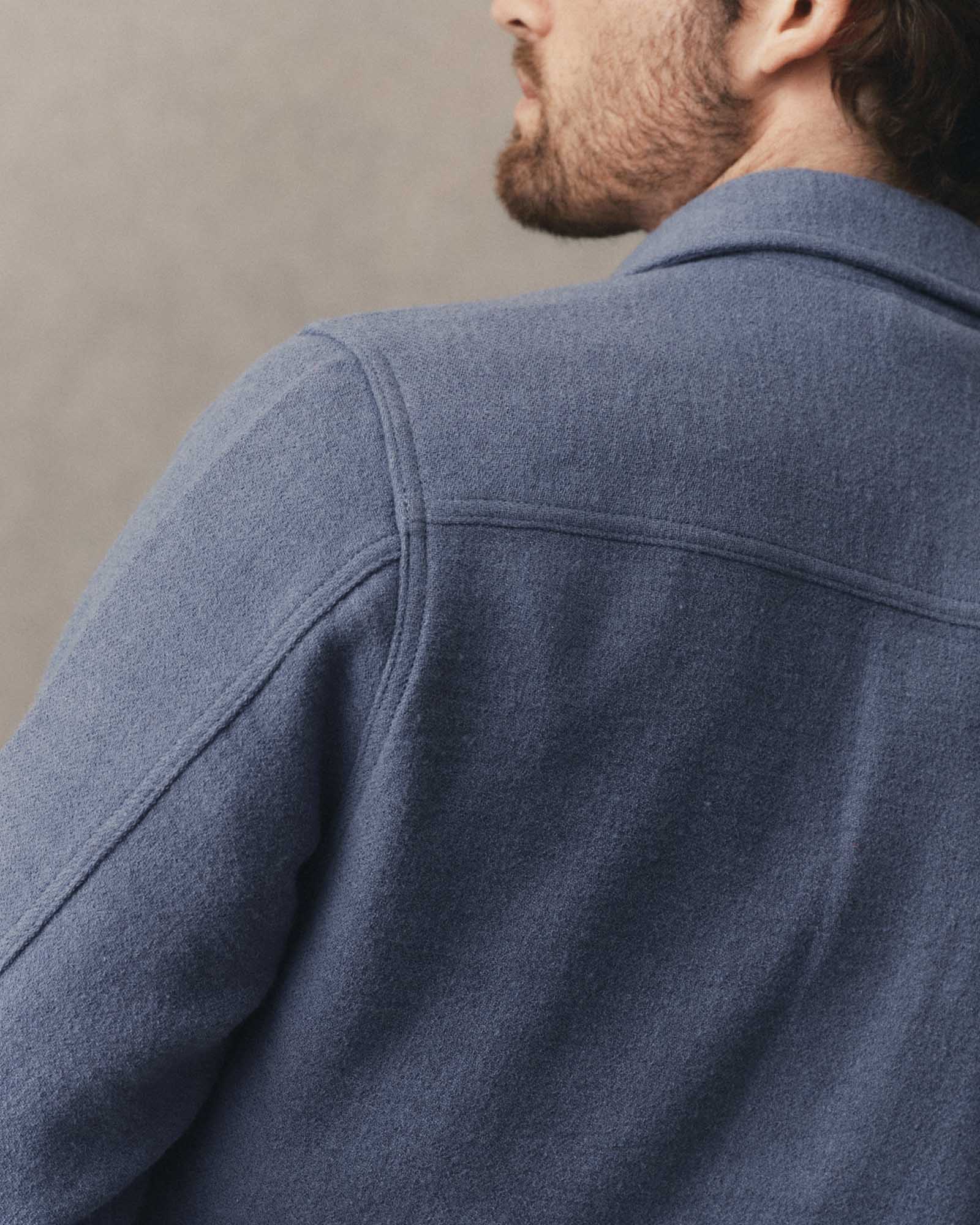 fit model showing off the back of The Kenne Shirt Jacket in Blue Fog Cotton Wool Crepe, Outerwear by Taylor Stitch