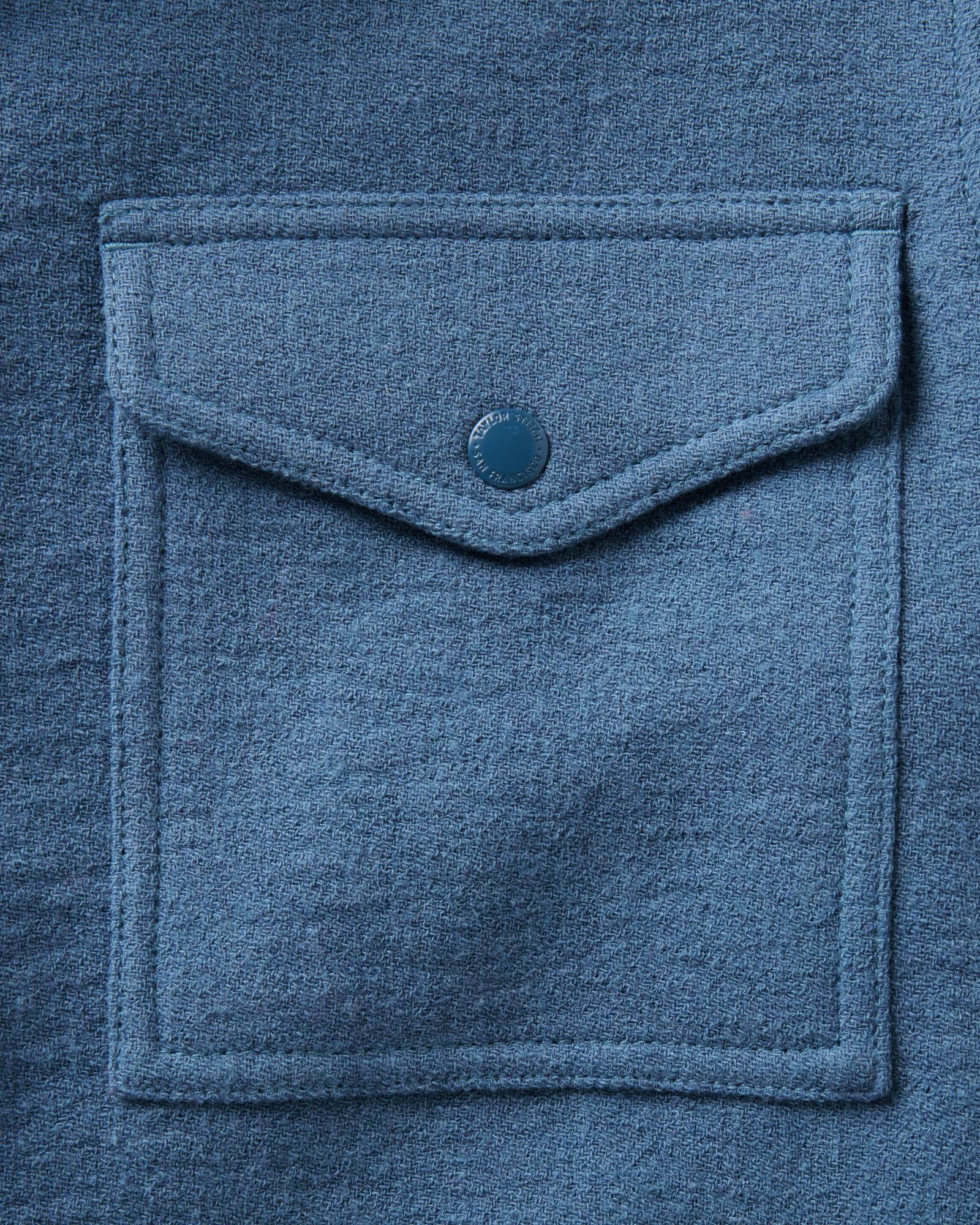 material shot of the pocket on The Kenne Shirt Jacket in Blue Fog Cotton Wool Crepe, Outerwear by Taylor Stitch