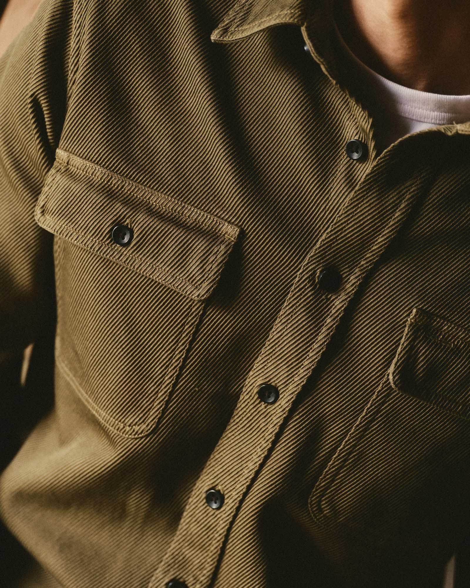 fit model showing off the pockets on The Ledge Shirt in Bay Leaf Twill, Wovens by Taylor Stitch